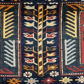 Antique Kuba long rug. Dated 1.904 (AH 1322),  375 x 135cm ( 101,5”x 66”).  
CAUCASIAN
 
This carpet features the appealing “Keyhole Design”. Two of the so-called ‘carnation’ borders, typical of  ...