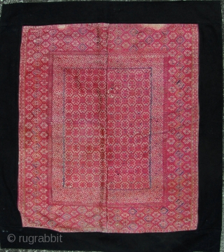 Beautiful old Zhuang minority textile from Guangxi Zhuang/Guizhou province, China. Woven in two panels with silk embroidered “diamond and star” patterned border, "wanzi" swastika key fret and well symbols. There are small  ...