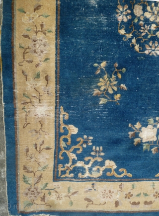 China Rug: Beijing/Tianjin carpet circa 1910, with floral design throughout. Worn down to the warp and weft in many places but no big tears and the selvedge seems to be complete and  ...