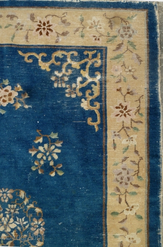 China Rug: Beijing/Tianjin carpet circa 1910, with floral design throughout. Worn down to the warp and weft in many places but no big tears and the selvedge seems to be complete and  ...