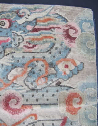 Tibetan Dragon Rug: Rare and wonderfully composed late 19th to early 20th century rug fragment. All wool pile, warp and weft with mostly natural dyes. A few small areas of missing pile  ...