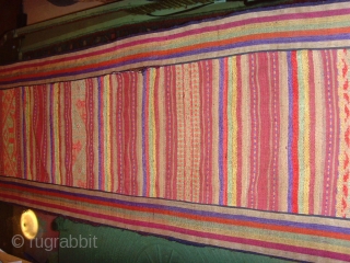 outstanding mosquito net border fine silk supplementary weft on a silk background, highly ornamented with stylized animals figures and variety of designs, edging is striped cotton. Excellent condition. 


Lao Tai.


Minority group Laos, Vietnam,  ...