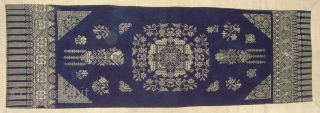 Cross Stitch Silk Embroidery on indigo hand span cotton, on an ivory hemp.   1.27 x 0.58 M.    Zhuang, China.   Late 19th Century.


    