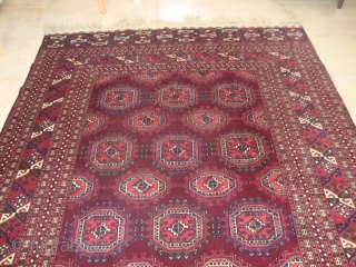 Beautuful saryk turkman carpet,  6'8''x10'10'' great condition, it was sent from Turkmenistan. The guls seem to float on the maroon field           