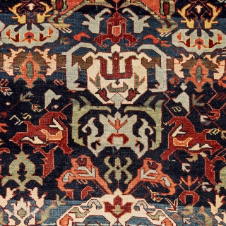 A joyful rug with the classical Bidjov ascending pattern and a rich palette of bright colors on a dark blue ground. While the structure is typically Shirwan, the pink color of the  ...