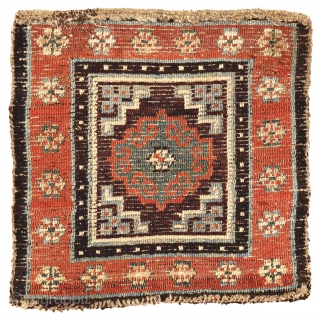Meditation mat with archaic Mandala, Tibet, circa 1850, 62 x 61 cm (24.5 x 24 inches)
Tibetan rugs with thick squarish knots and a brilliant palette are considered among the earliest, often referred  ...
