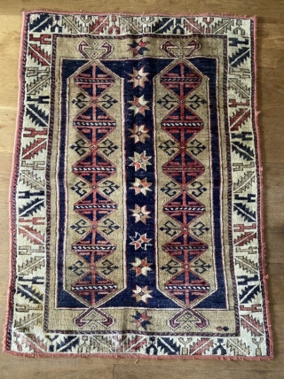 Small Anatolian Kozak rug (thanks John Bakti) with deep natural colors and glossy wool. Three humanoid figures in the border (1 in upper, two in lower). Tribal pattern (similar examples have been  ...