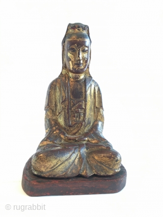 Chinese Guanyin figure, around 1700. Wood, traces of lacquer. This figure still has individual features, distinguishing older examples. Beautiful and serene. Size 8.7 x 5.1 x 4.3 inch (22 x 13 x  ...