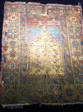 mid 19th century central Anatolian  mujur rug rough condition but great color size 46"X58"                  