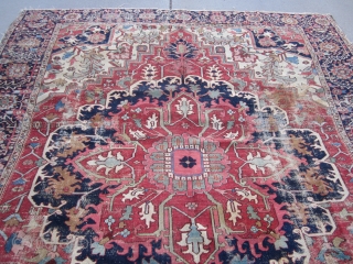 antique heriz serapi rug measuring 9' 5" x 11' 3" great design and colors has wear but solid rug very floppy  both ends and sides are good no holes clean rug  ...