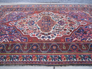 very decorative and beautiful persian bakhtiari rug measuring 5' 5" x 8' 5" loose selvage even pile nice condition price is 750.00 plus shipping
sold thanks        