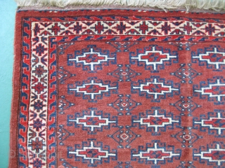Antique Yomud chuval, bag face, hand knotted wool, Turkmenistan, ca. 1900, strong condition with sides and end finishes intact, some staining, red color run, the approximate size is 32 inches x 44  ...