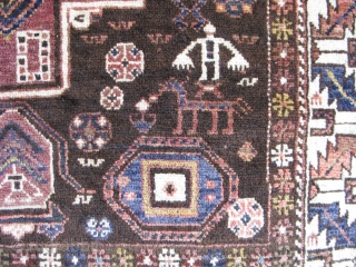 Antique Konaghend Caucasian rug, hand knotted wool on a wool foundation, Caucasus Mountains, Azerbaijan, ca.1920's, there is a small prayer niche at the bottom, human and animal figures, signed "Aranna" on one  ...