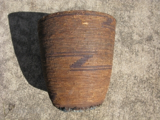 Old African basket, finely hand coiled plant fiber, some weavers dyed indigo, Tutsi People of Rwanda, prior to 1950, it has a beautiful patina that only comes with age, the Tutsi are  ...