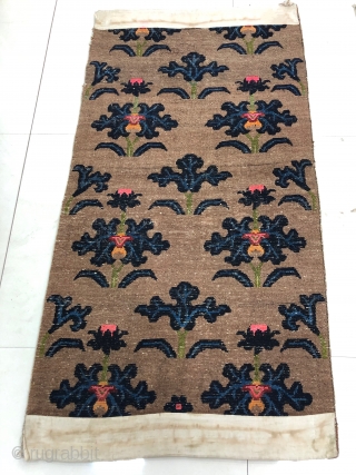 Antique Tibetan rug, good age and conditions. camel color with lotus flowers. Size 174 cm *90cm                 