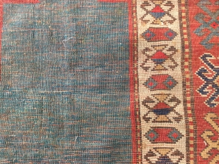 Sweet little kazak prayer rug dated 1902 or 3. Good condition. Simple and effective design. Good weave. 58 by 38 inches. Small area of repile on bottom left of the rug.  