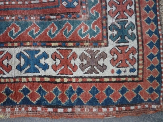 19th century kazak. Couple of tears and some wear but some good colours and appealing design elements. 188 by 139 cm. ask for more photos if you want.     