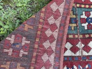 Dirty bashed up Kazak. Couplw of holes, rips and tears bur great colours and design. Ans despite its issues a great rug. Turkish repair special? 7 x 5 feet    