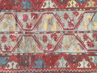 Late 19th century melas. Pretty range of colours. Great inner border. Cute design. edges secured. Sadly quite a lot of repiling of the delicate blue in the centre of the field and  ...