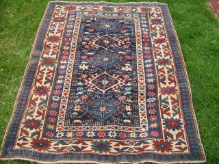 Beautiful circa 1900 Shirvan rug [5'6"x4'2" or 167x127 cm]. Excellent condition with original sides, perfect handle, all wool with natural colors, strong design with many S's and combs, unusually sharp crabs border.  ...