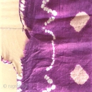 Ceremonial plangi from Bali, very fine silk fabric with beautiful coloures in red/violet and yellow /orange.
It is a part of a festival dress for woman, about 20th centery.
The thin fabric knows some  ...