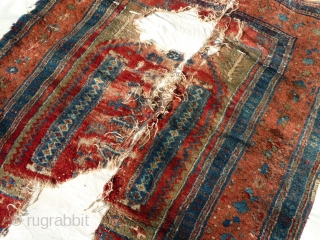 Unusual Anatolian Prayer Rug Fragment- Yuruk or Not Yuruk! That is the question.

   Even though this piece shares similar design elements common to Yuruk type prayer rugs such as the  ...