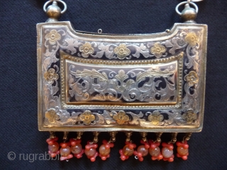 Amulet Box; Uzbekistan or the Caucasus; Superb quality niello work inlaid with silver and gold decorated with coral,rose quartz and turquoise , the box 19thcent. the chain later with Tsarist era silver  ...