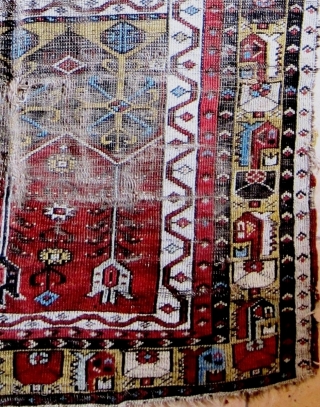 A 19th Century Ladik Prayer Rug 
 Size 184 x 114 cm
A fragmented Ladik prayer rug in poor original condition, losses to selvedges and both ends, with good colours, very soft handle,  ...