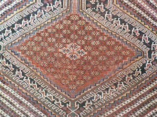 Attractive antique Khamseh with vibrant colours. Partially low pile and a small area with a reparation and a very small hole (see last two photos). Size is 220 x 153 cm.  