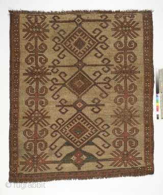 Kyrgyz eshik tysh (tent door covering), 1850's, Central Asia, Alay mountains, 130 by 111 cm, an early and rare white type, low pile, stain to upper diamond, small reweaves, otherwise in a  ...
