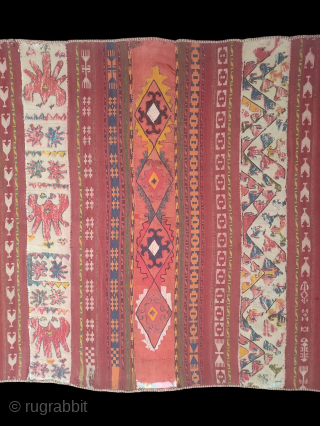 Uzbek Kilim, Central Asia, 1920s, 317 x 130 cm, wool, wool embroidery, narrow bands of plain weave over-embroidered with Central Asian motifs, in good condition, scattered loss of embroidery.    