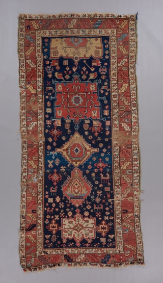 Shaqaqqi Kurdish rug per Jim Burns' description of a similar piece in his book on Kurdish rugs. Probably mid 19th century or earlier. 7'1" x 3'4".

Please visit our website for more rare  ...