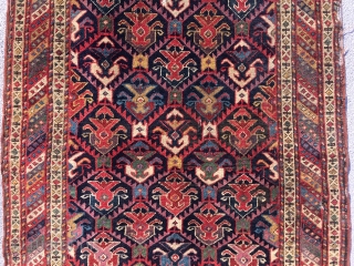 Mid 19th century northwest runner . Spectacular colors . Wool warps and cotton wefts. Cut at one end . A few small tears . App. 10' x 3'.     