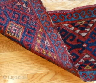 Uzbek Napramach cradle rug. 34 x 14 inches. Mostly medium to low pile. A few knots worn down. Minor edge and end loss. See www.banjaratextiles.com for more rugs and textiles.
   