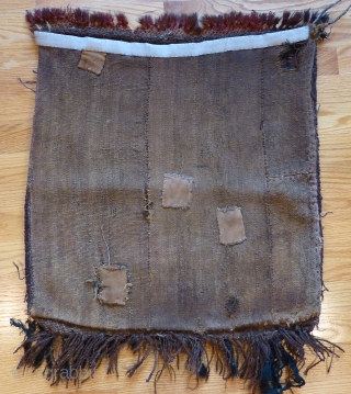 Old Kirghiz bag, with back. 24 x 22 inches. Good thick pile. Red knotted fringe at one end was added later. Interesting Central Asian bag. Velcro hanging strip sewn to back, which  ...