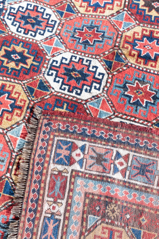 Large Kazak Moghan rug ? 
Two different border and humans are represented , colors are very warm an fresh . 
Size : 275/170 cm 

If you need information : voyageethnique@gmail.com   