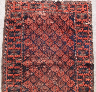 Fine Antique Baluch Rug, Great scale and drawing with several dark blues and practically sculptural corrosion to the browns. Khorosan variety an all-over repeat field derived from flatweaves and a boldly drawn  ...