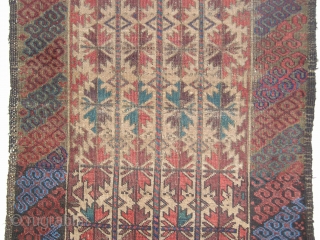 Camel-Ground Baluch rug . Perhaps Bahluli according to recent research. (see the current issue of Hali) Colorful latch-hook border (interestingly, there are no minor borders) and a great rendition of the classic  ...