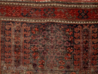 Antique Baluch rug or small main carpet (7'4"x4'6") from Khorosan, ne Persia. Timuri type shrubs and trees and unusual geometric elements. Worn but complete with natural colors including four blues, one corrosive,  ...