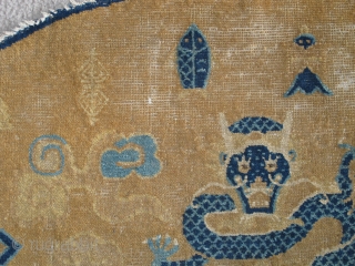 Large Chinese Ningxia Throne back with dragons, probably Kangxi period. About a meter wide. sides complete with weft returns, perhaps two inches missing from bottom, eccentric knotting, great drawing.    