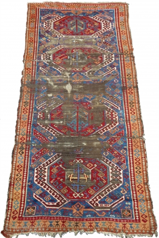 East Anatolian Kurdish long rug with a Caucasian Lenkoran design.  Vibrant color,  exceptional wool, worn. 3 different main border types.           
