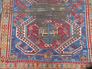 East Anatolian Kurdish long rug with a Caucasian Lenkoran design.  Vibrant color,  exceptional wool, worn. 3 different main border types.           