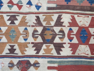 Central Anatolian kilim fragment. long strip with great colors on a white ground. Mounted and conserved.                 