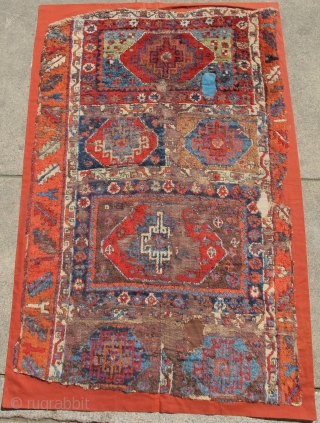 East Anatolian Kurdish Rug with  Memling Guls. Probably 18th century with a rich, diverse and moody color palette, exceptional wool and dramatic drawing. Worn and fragmented but gorgeous, mounted and conserved.  ...
