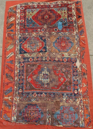 East Anatolian Kurdish Rug with  Memling Guls. Probably 18th century with a rich, diverse and moody color palette, exceptional wool and dramatic drawing. Worn and fragmented but gorgeous, mounted and conserved.  ...