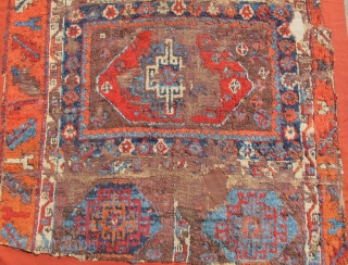 East Anatolian Kurdish Rug with  Memling Guls. Probably 18th century with a rich, diverse and moody color palette, exceptional wool and dramatic drawing. Worn and fragmented but gorgeous, mounted and conserved.  ...