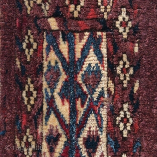 Yomut Turkmen igsalyk (spindle bag). Natural colors including cochineal with a distinctive purple-blue that is probably the result of an indigo and cochineal double dye. Evocative vegetal imagery against an ivory ground,  ...