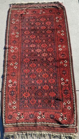 Boucher-esque Khorosan Baluch rug with Memling tile design. Animals drawn all over the place including the field, border, and even within the flatwoven ends. Good state of preservation with sides and ends  ...