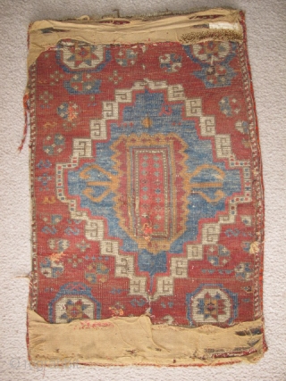 Yastik-shaped East Anatolian pastiche nicely assembled from what must have been a great East Anatolian Sivas? rug. Thick pile, good colors, could use a wash. 33"x22"       