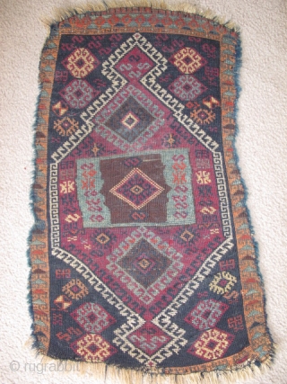 East Anatolian Kurdish yastik, beautiful shimmering unlined center, 3 blues and a lighter blue weft than most of this type. Complex use of abrash. A very authentic antique village piece with good  ...
